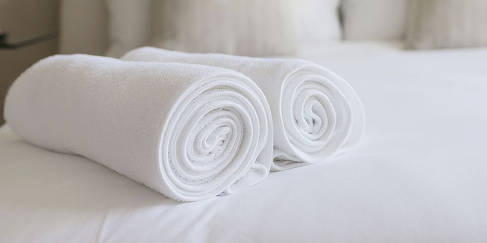 White towels on a white bed